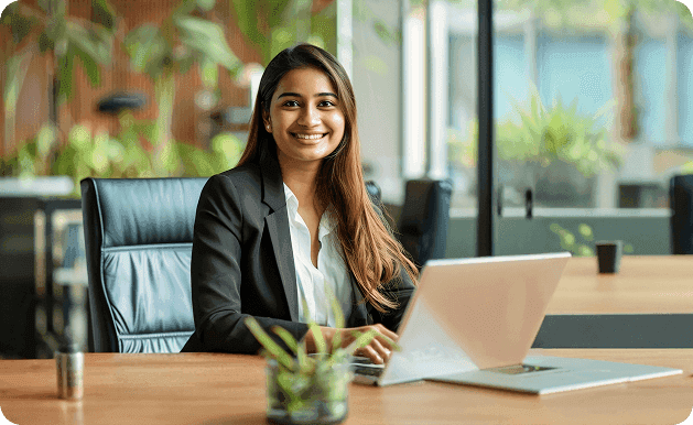 A healthcare professional working at her desk
